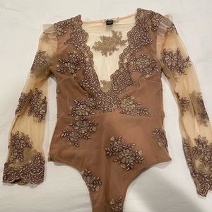 Beautiful lilac bodysuit